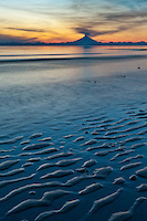 Plume of gas and vapor vent from the summit of Mt. Redoubt volcano (10,191 ft), of the Chigmit mountains, Aleutian range. View across Cook Inlet approximately 50 miles, at sunset, southcentral, Alaska.