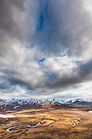 View of the Nigu river looking south at the Brooks range mountains, Gates of the Arctic National Park, Alaska.