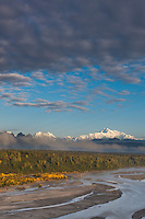 View of the south summit of Mt McKinley, locally called "Denali", North America's tallest mountain, 20,320 ft., Chulitna river and the Tokosha mountains from the Denali south viewpoint along the George Parks highway.