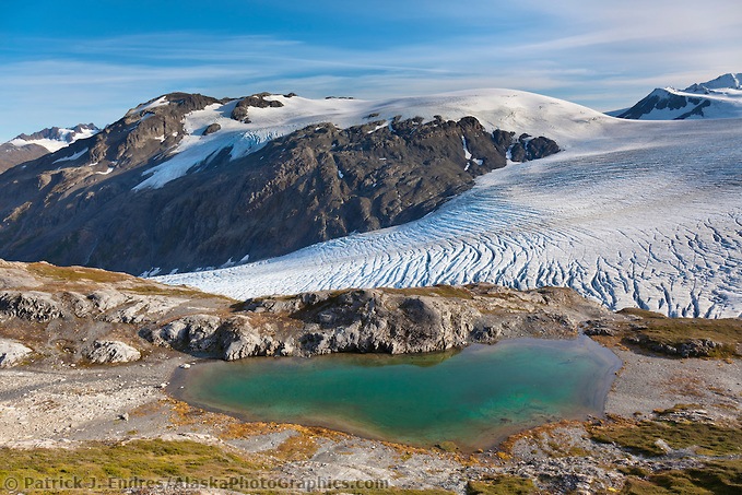 Mountain pond and the Exit glacier and Harding Ice Field, Kenai Fjords National Park,  Kenai Peninsula, southcentral, Alaska. (Patrick J. Endres / AlaskaPhotoGraphics.com)