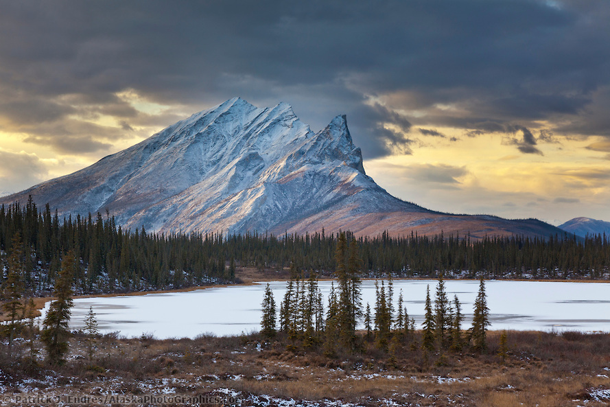 Mt Sukakpak and a small tundra pond in the Brooks range, arctic Alaska. (Patrick J. Endres / AlaskaPhotoGraphics.com)