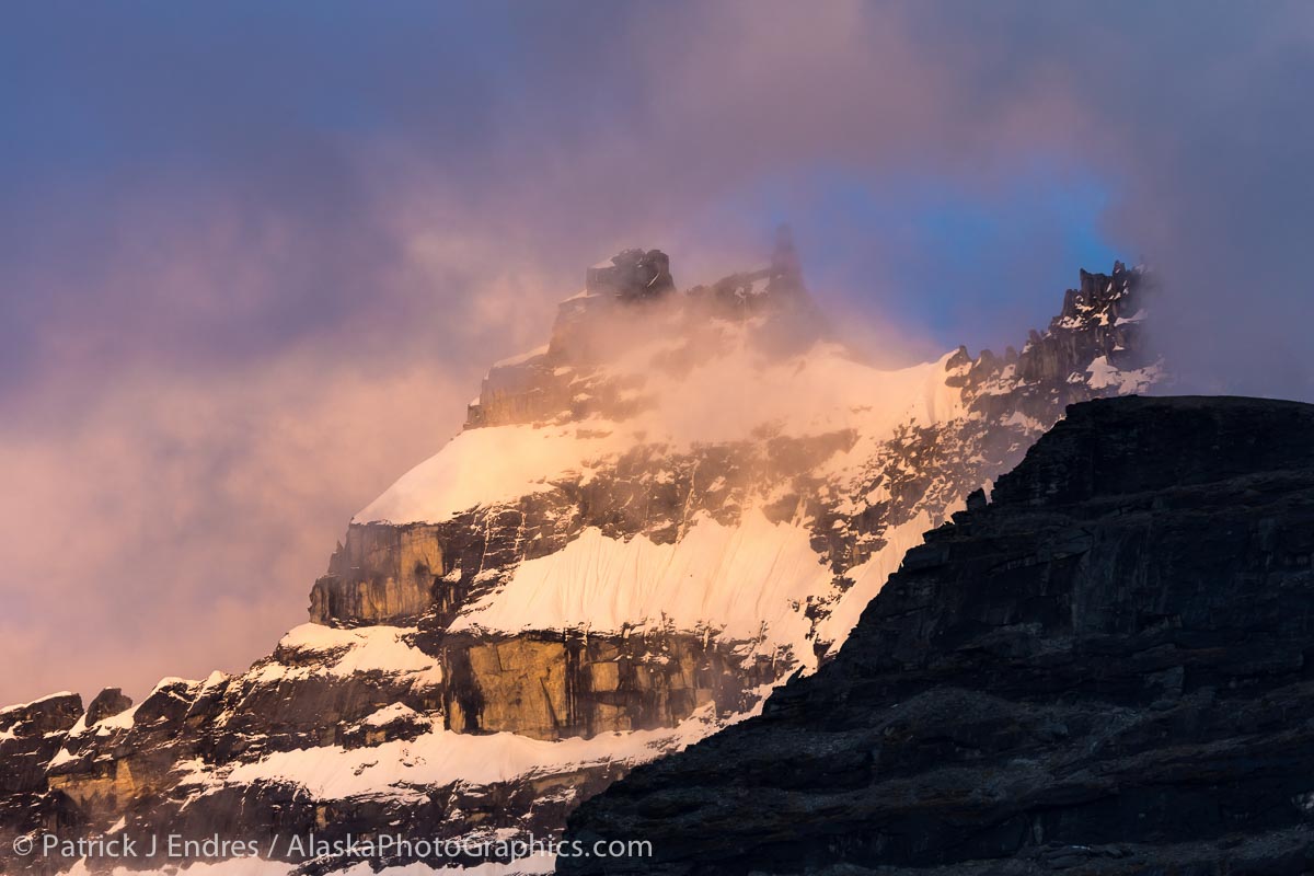 The granite-spired summit of Mt. Igikpak, the tallest mountain in the Brooks Range (8,500 ft.), was enshrouded in clouds most of the time. But for a slight moment, the very shy summit opened up. It was the first time I saw the summit and raced about 1000 feet through boulder rubble to grab this shot of a very ephemeral moment!