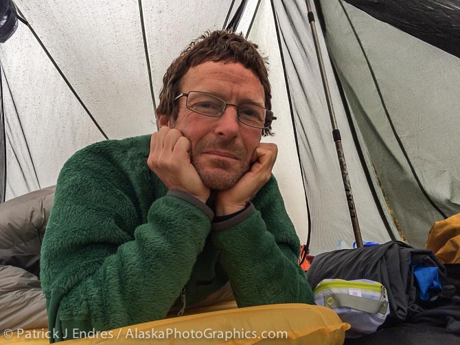 Waiting out a rainstorm in my tent.